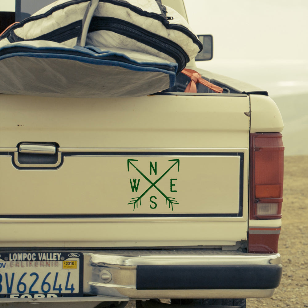 NESW compass with arrows | Bumper sticker