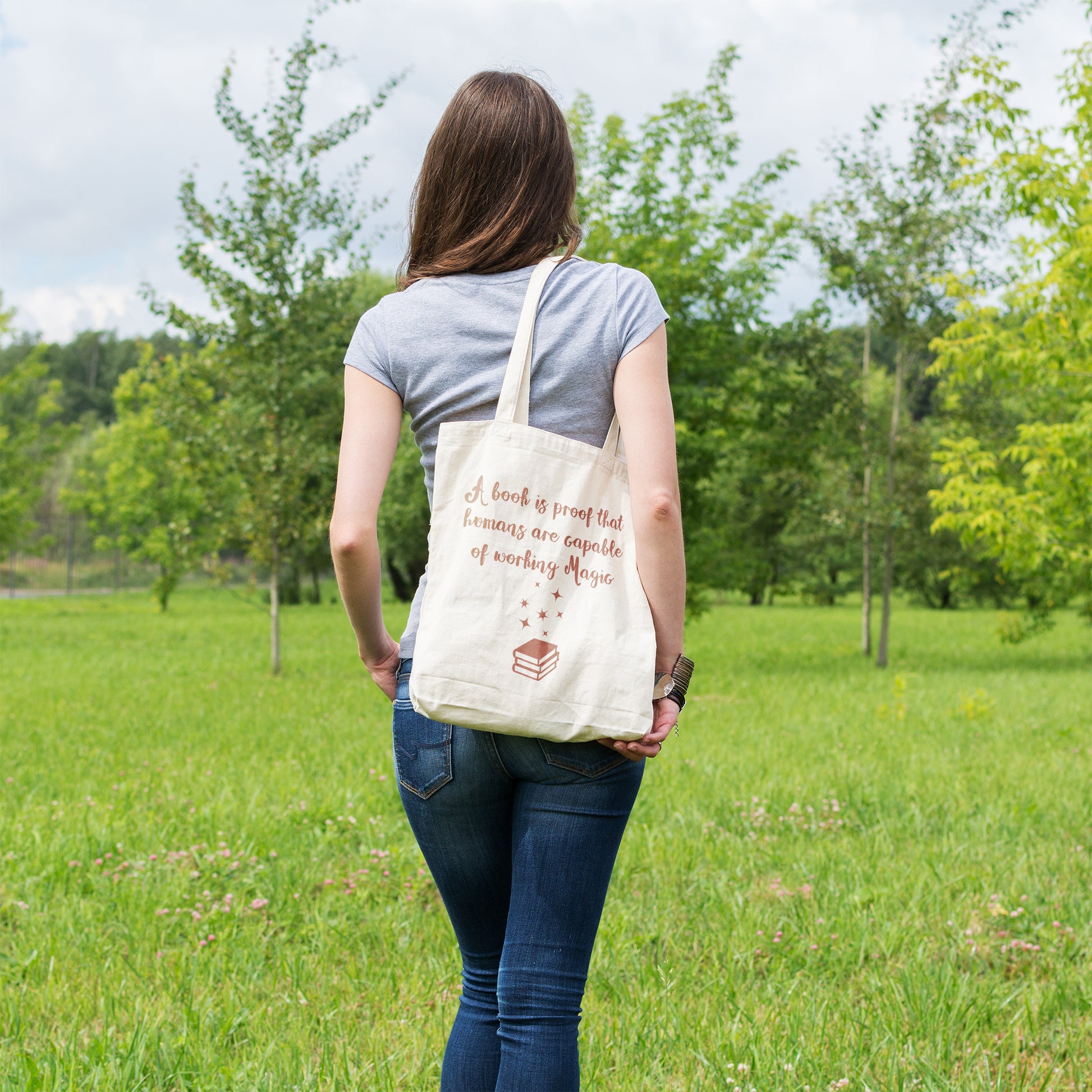 A book is proof that humans are capable of working magic | 100% Organic Cotton tote bag-Tote bags-Adnil Creations